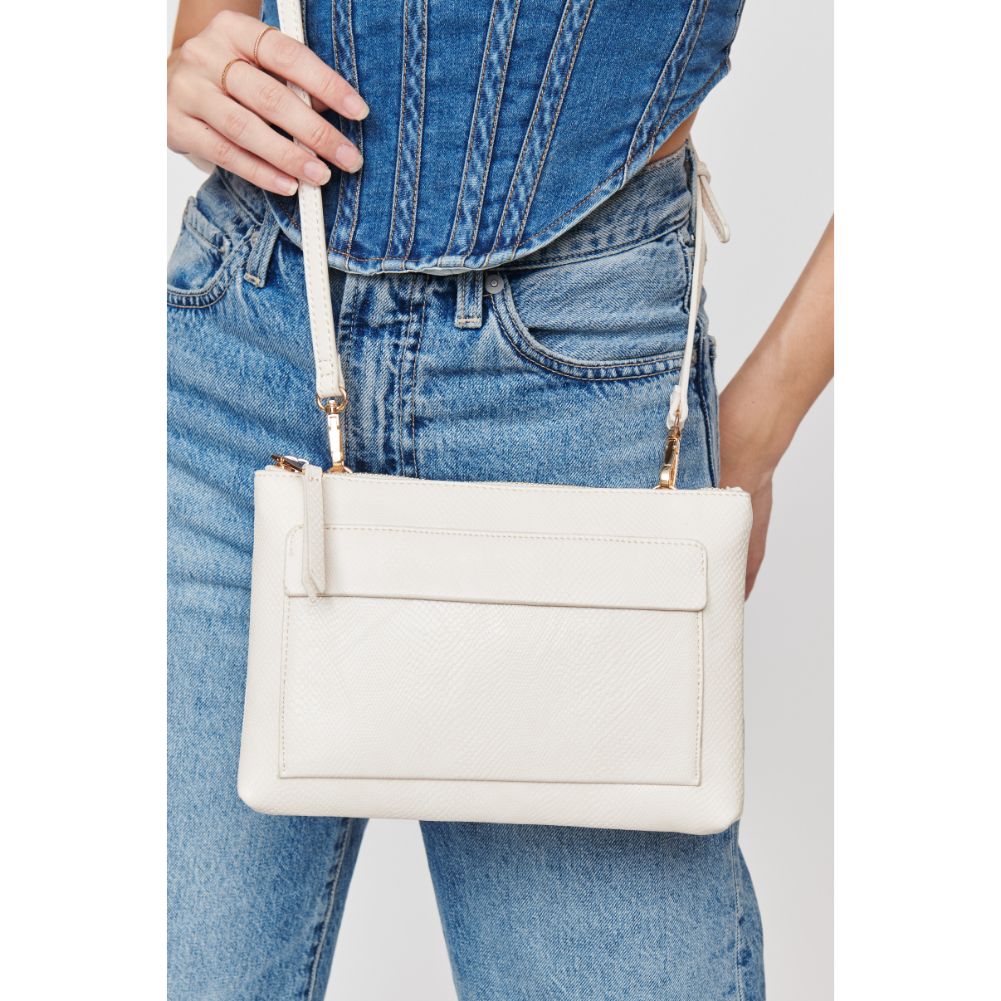 Woman wearing Oatmilk Urban Expressions Morris Lizard Crossbody 840611108524 View 1 | Oatmilk