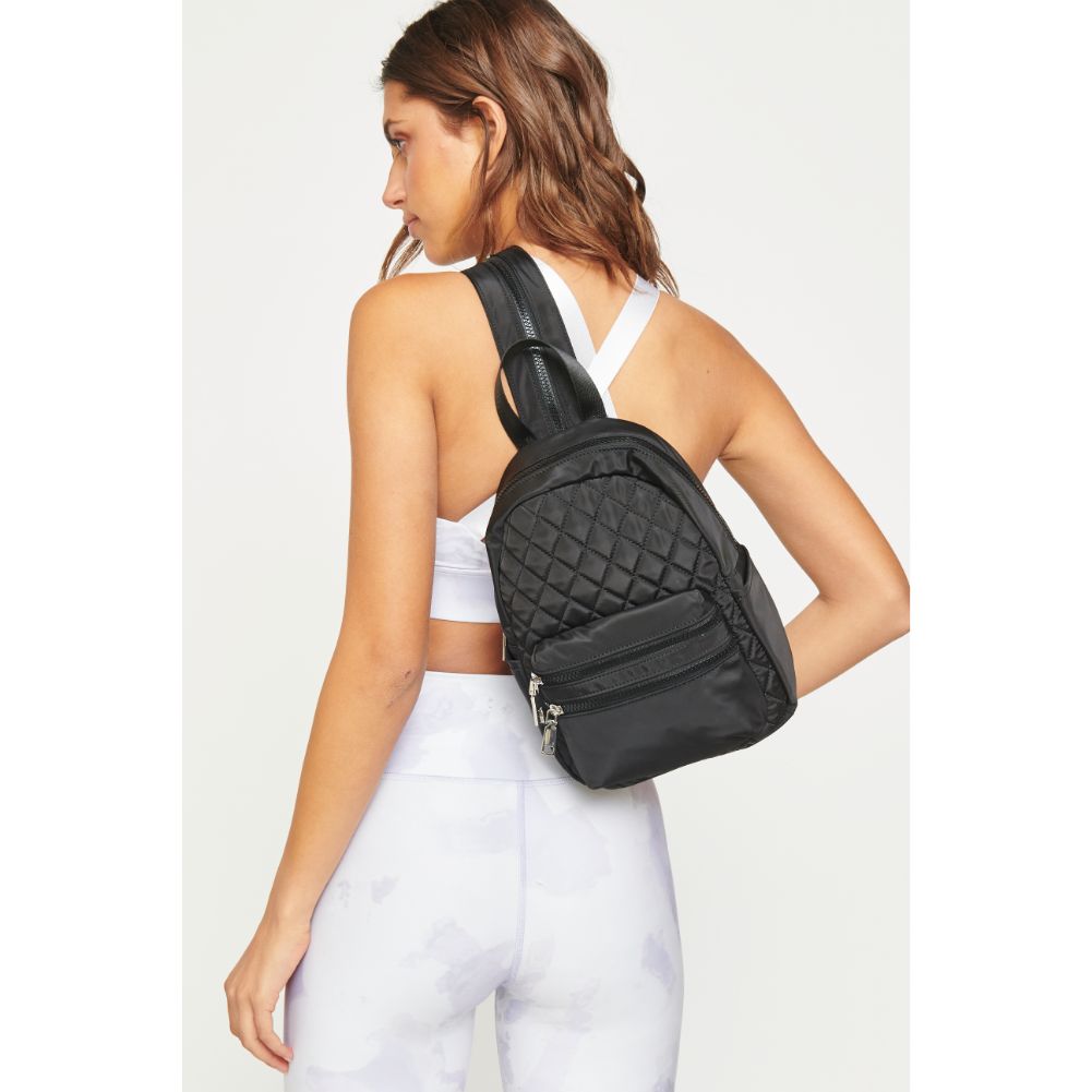 Woman wearing Black Urban Expressions Brynlee Sling Backpack 840611180452 View 3 | Black