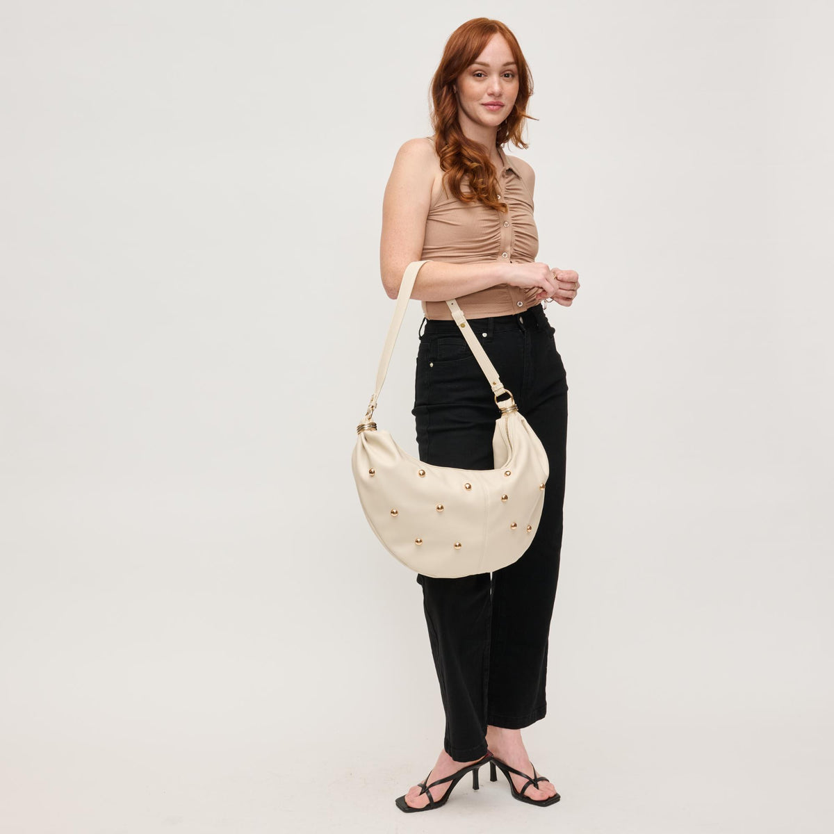 Woman wearing Ivory Urban Expressions Bianca Hobo 840611151148 View 2 | Ivory