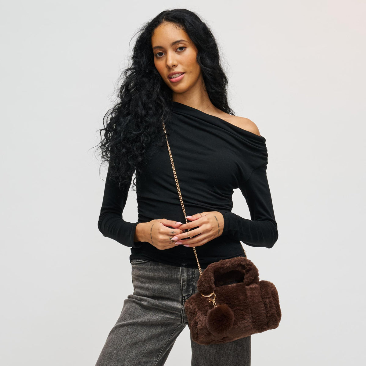 Woman wearing Chocolate Urban Expressions Lexi Crossbody 840611199843 View 3 | Chocolate