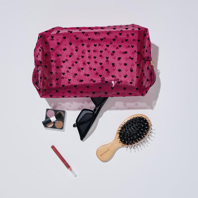 Woman wearing Hot Pink Urban Essentials See Through You Cosmetic & Travel Organizer Pouch 840611197061 View 1 | Hot Pink