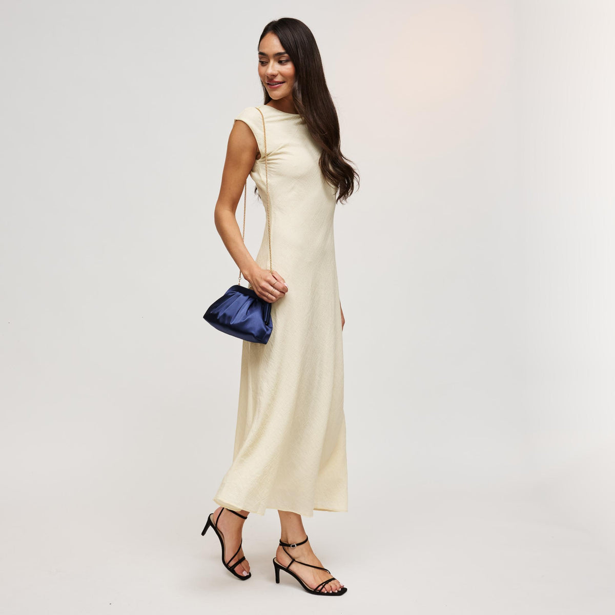 Woman wearing Midnight Urban Expressions Winter Clutch 840504211720 View 4 | Midnight