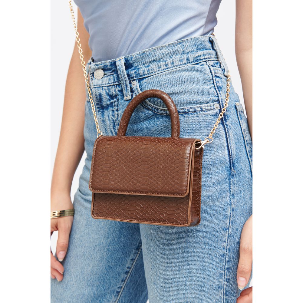 Woman wearing Chocolate Urban Expressions Faye Top Handle 840611184801 View 2 | Chocolate