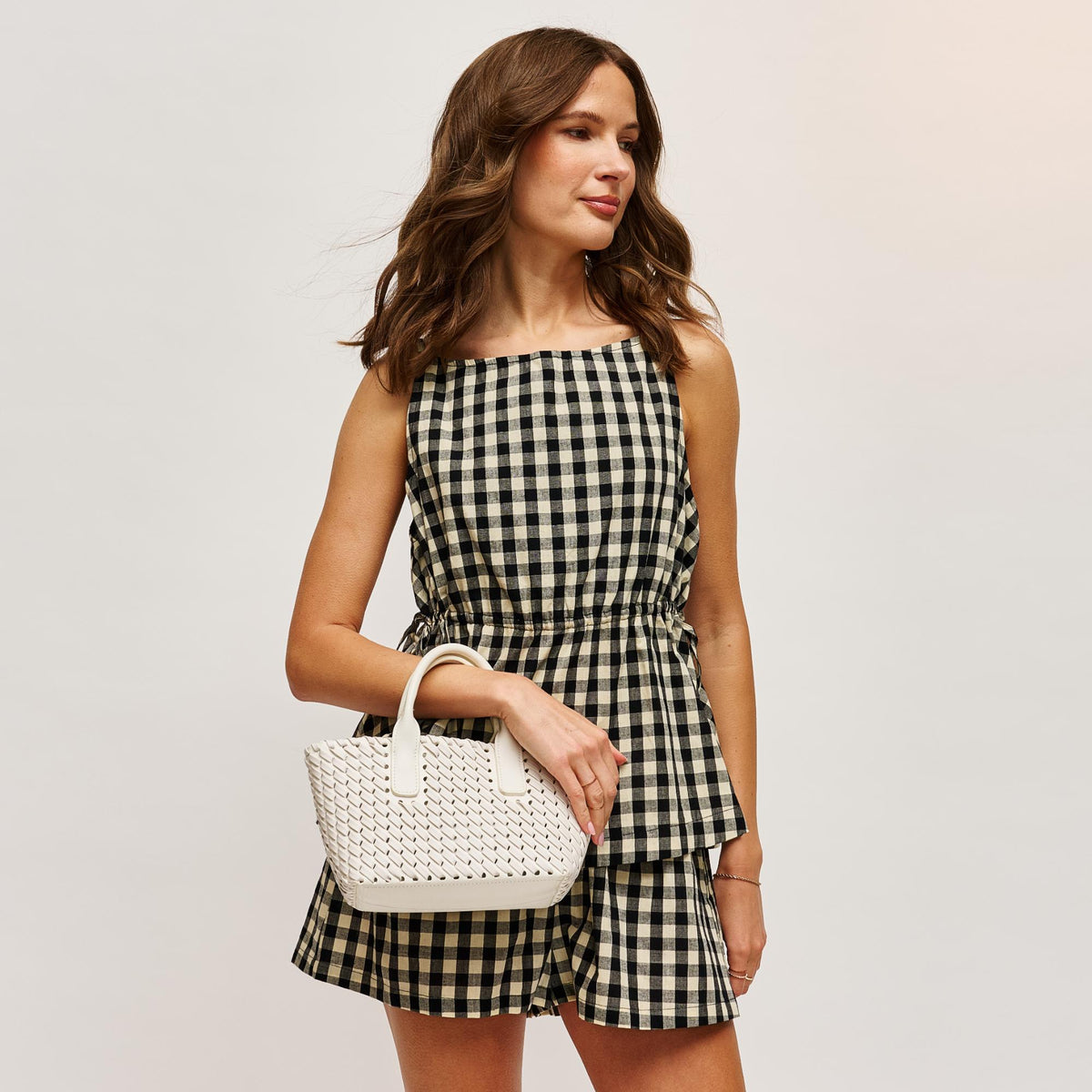 Woman wearing Ivory Urban Expressions Paisley Tote 840611126313 View 1 | Ivory