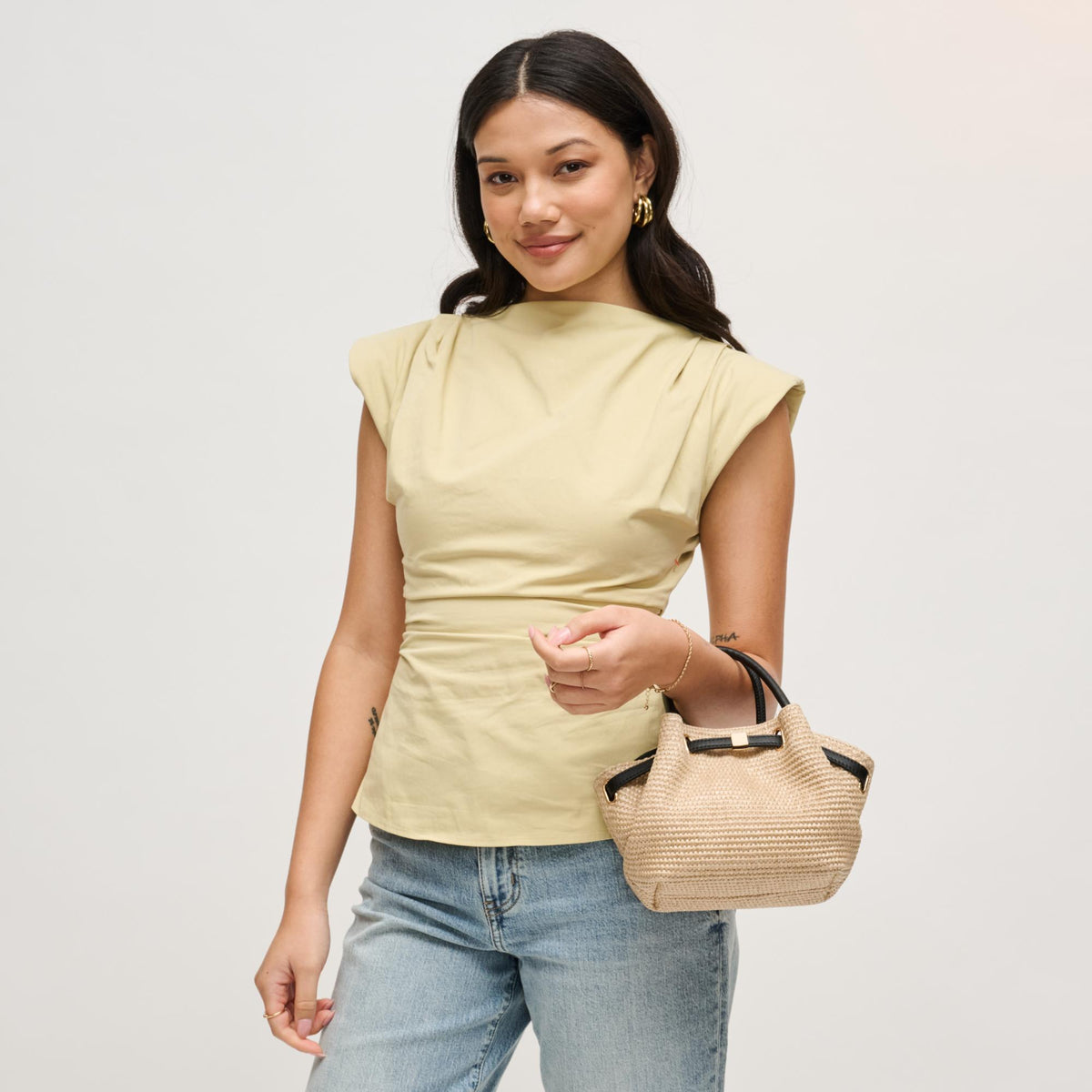 Woman wearing Natural Black Urban Expressions Selena - Straw Crossbody 840504204876 View 4 | Natural Black