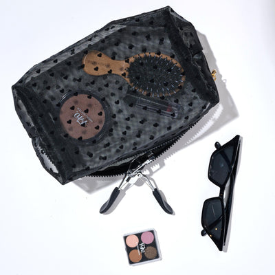 Woman wearing Black Urban Essentials See Through You Cosmetic & Travel Organizer Pouch 840611197078 View 1 | Black