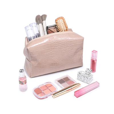Woman wearing Natural Urban Essentials Croc Chic Cosmetic & Travel Organizer Pouch 840504210037 View 1 | Natural