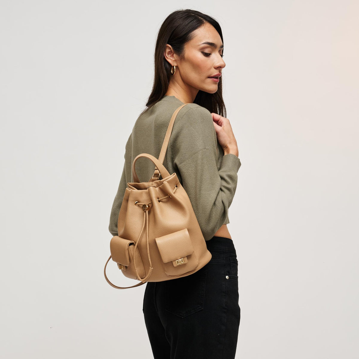 Woman wearing Natural Urban Expressions Clearfield Backpack 840504212383 View 1 | Natural