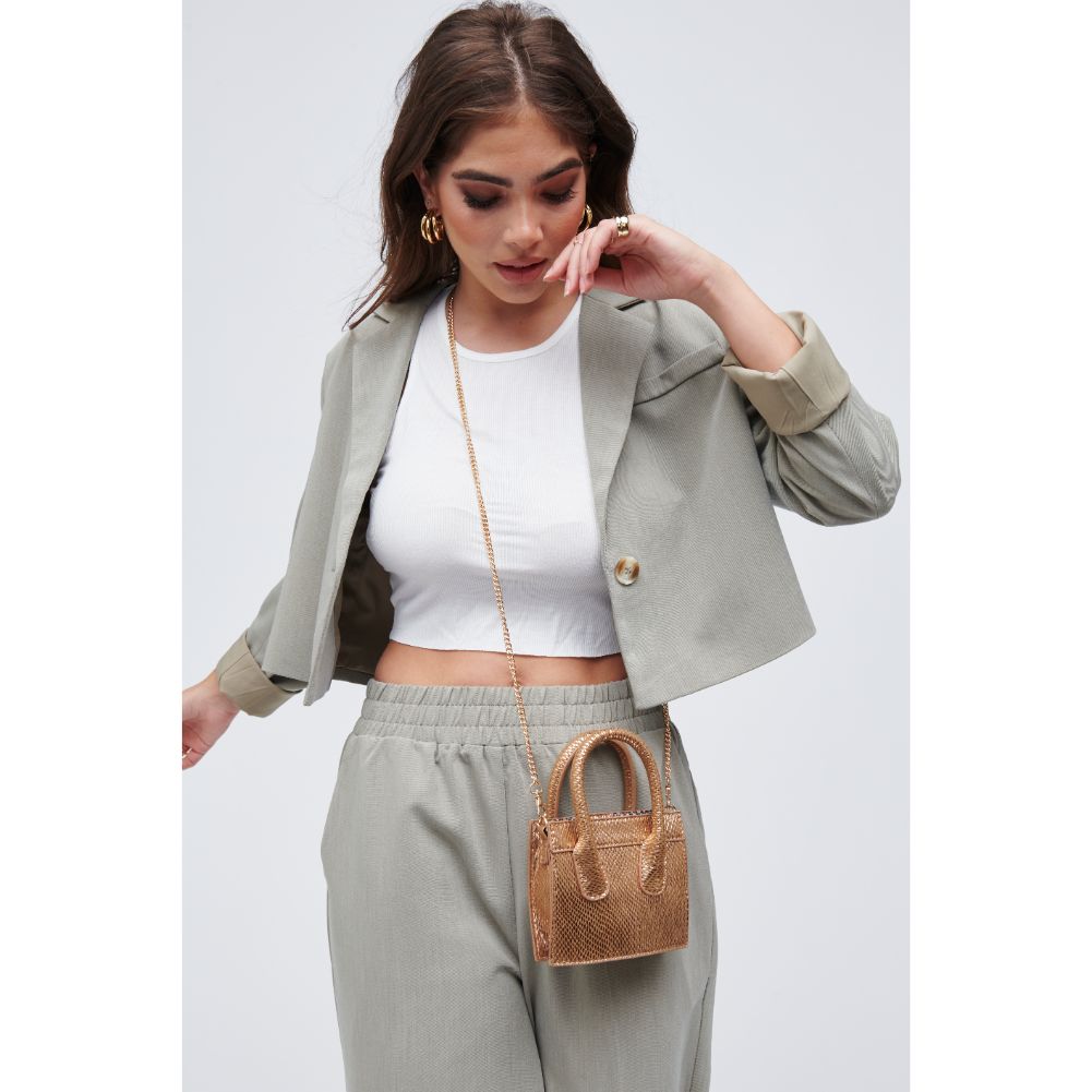 Woman wearing Rose Gold Urban Expressions Daria - Snake Crossbody 818209011181 View 2 | Rose Gold