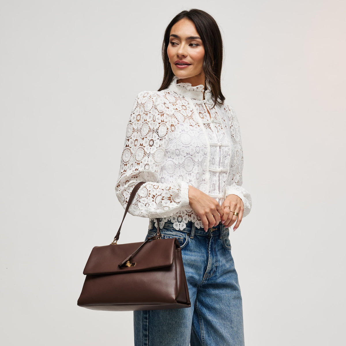 Woman wearing Espresso Urban Expressions Arrow Satchel 840504212932 View 1 | Espresso