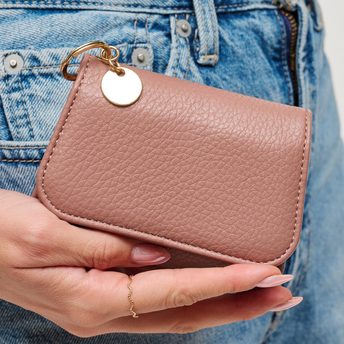 Woman wearing Blush Urban Expressions Ben Wallet 840504201295 View 1 | Blush