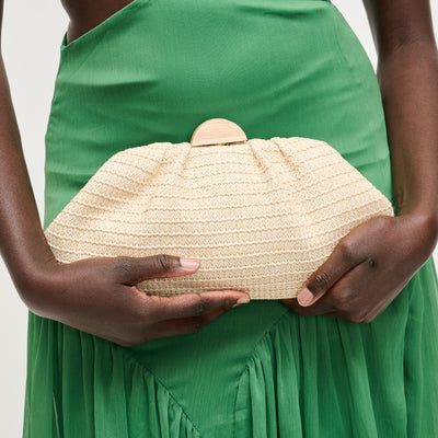 Woman wearing Natural Urban Expressions Dorothea Clutch 840504204302 View 1 | Natural