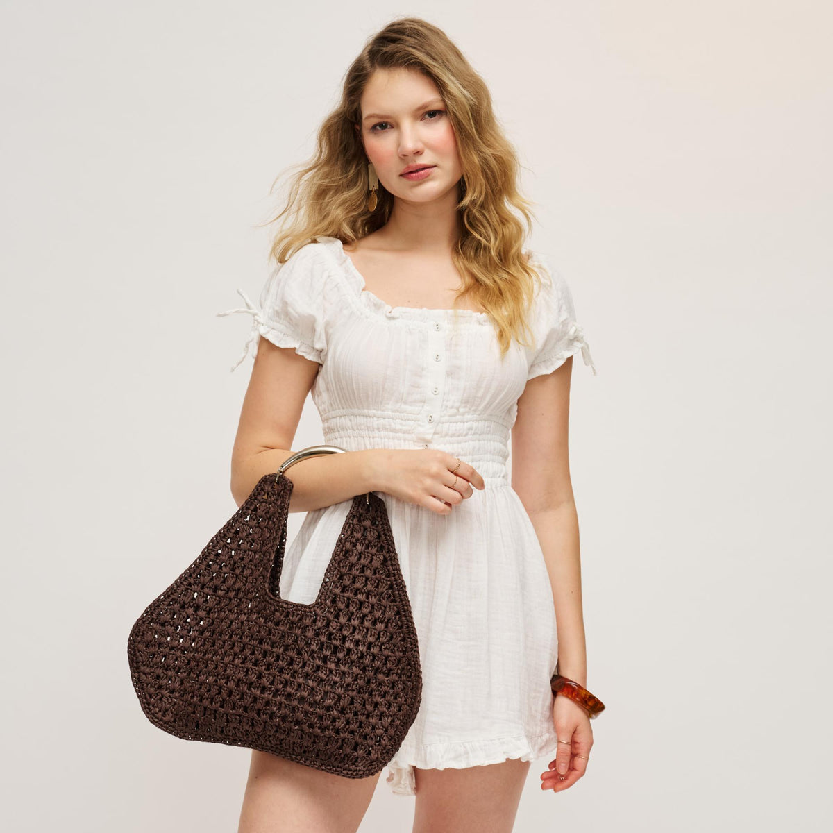 Woman wearing Chocolate Urban Expressions Iris Hobo 840504204838 View 1 | Chocolate