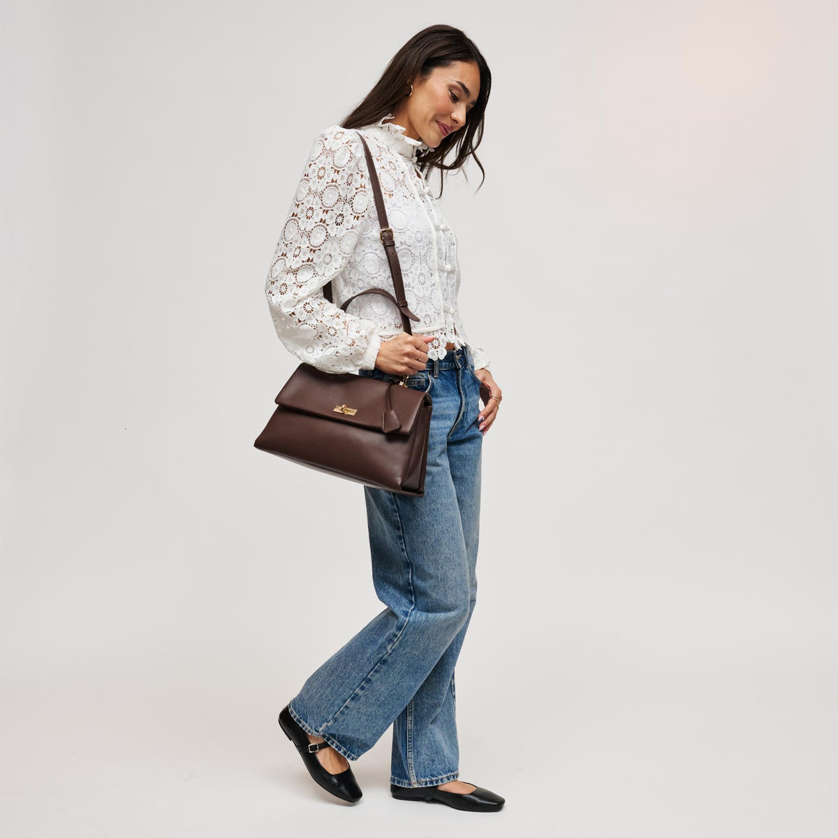 Woman wearing Espresso Urban Expressions Arrow Satchel 840504212932 View 4 | Espresso