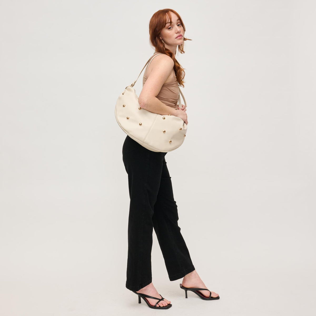 Woman wearing Ivory Urban Expressions Bianca Hobo 840611151148 View 4 | Ivory