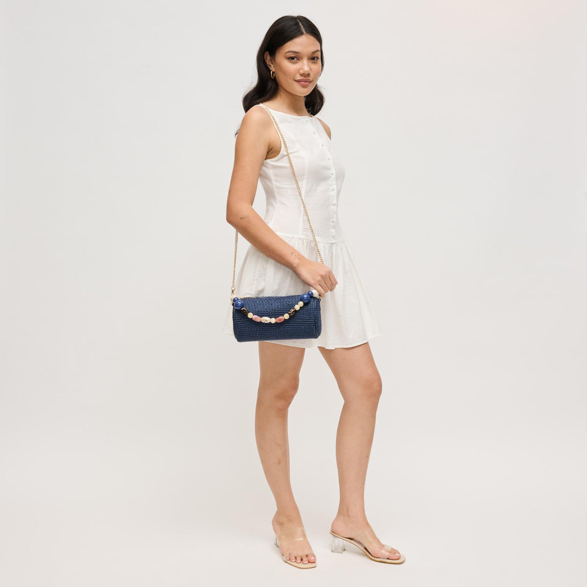 Woman wearing Navy Urban Expressions Rachel - Straw Clutch 840504206245 View 2 | Navy