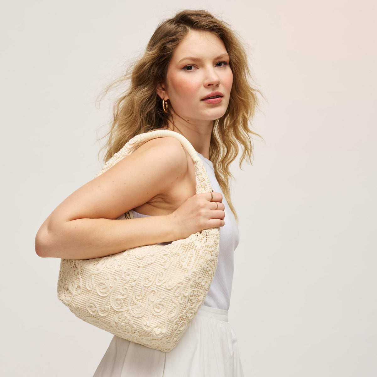 Woman wearing Ivory Urban Expressions Micah Hobo 840504205224 View 1 | Ivory