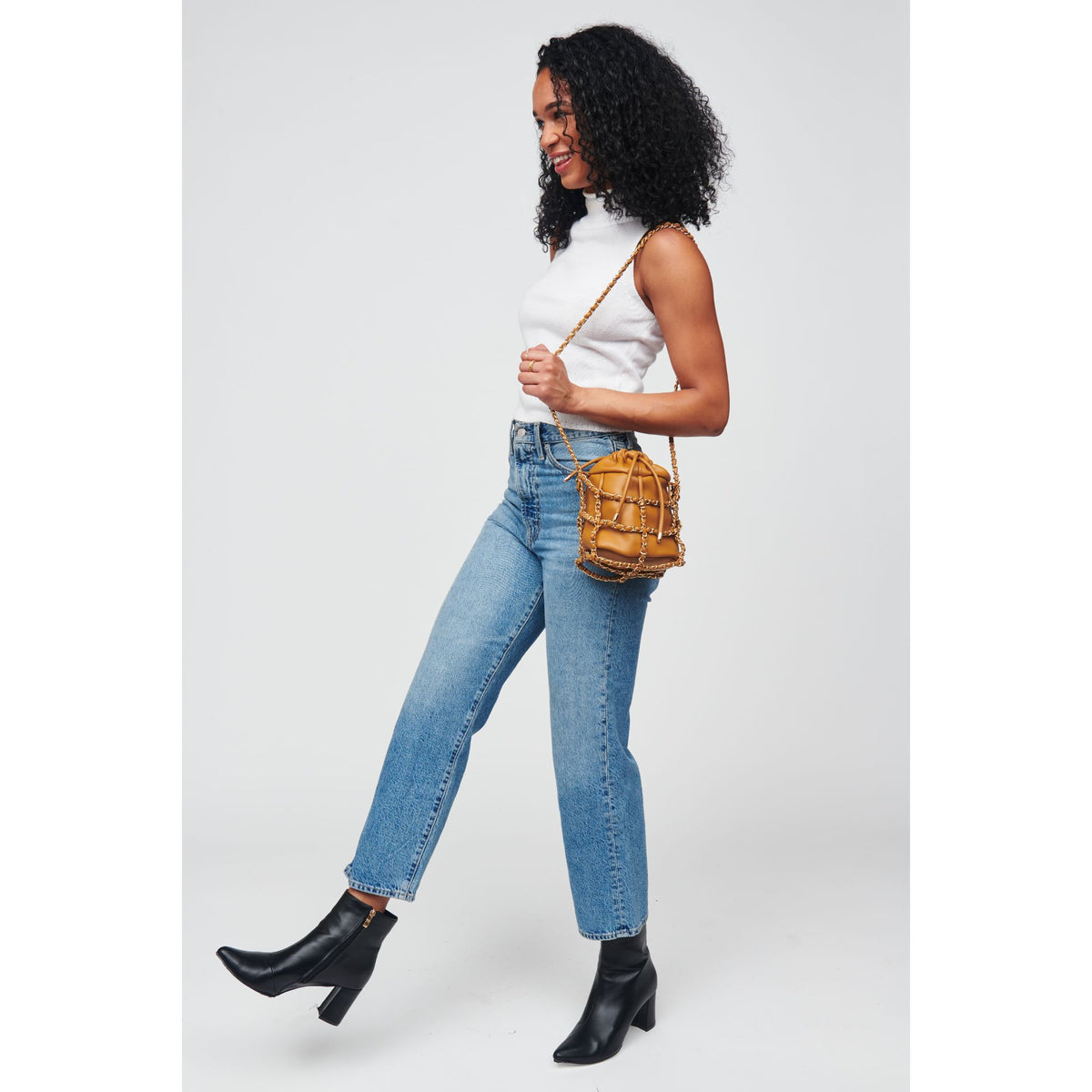 Woman wearing Caramel Urban Expressions Moira Crossbody 818209012324 View 4 | Caramel
