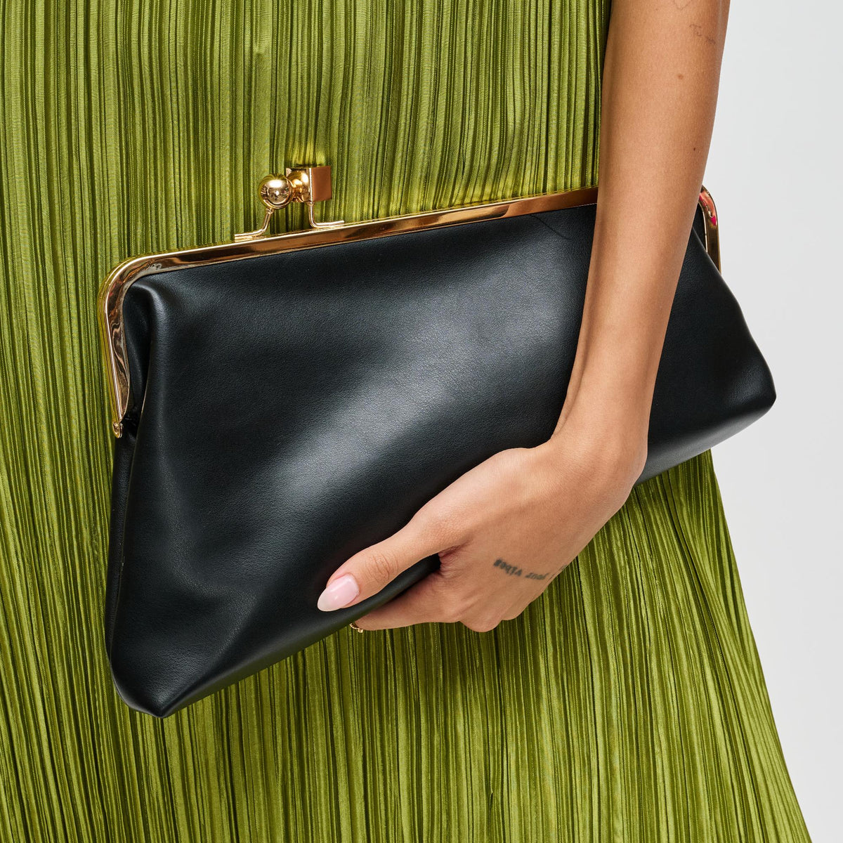 Woman wearing Black Urban Expressions Helena Clutch 840504200137 View 1 | Black
