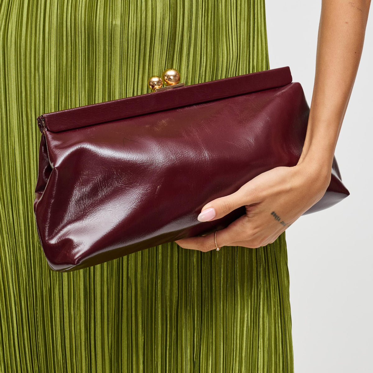 Woman wearing Burgundy Urban Expressions Joplin - Kisslock Clutch 840504200793 View 1 | Burgundy