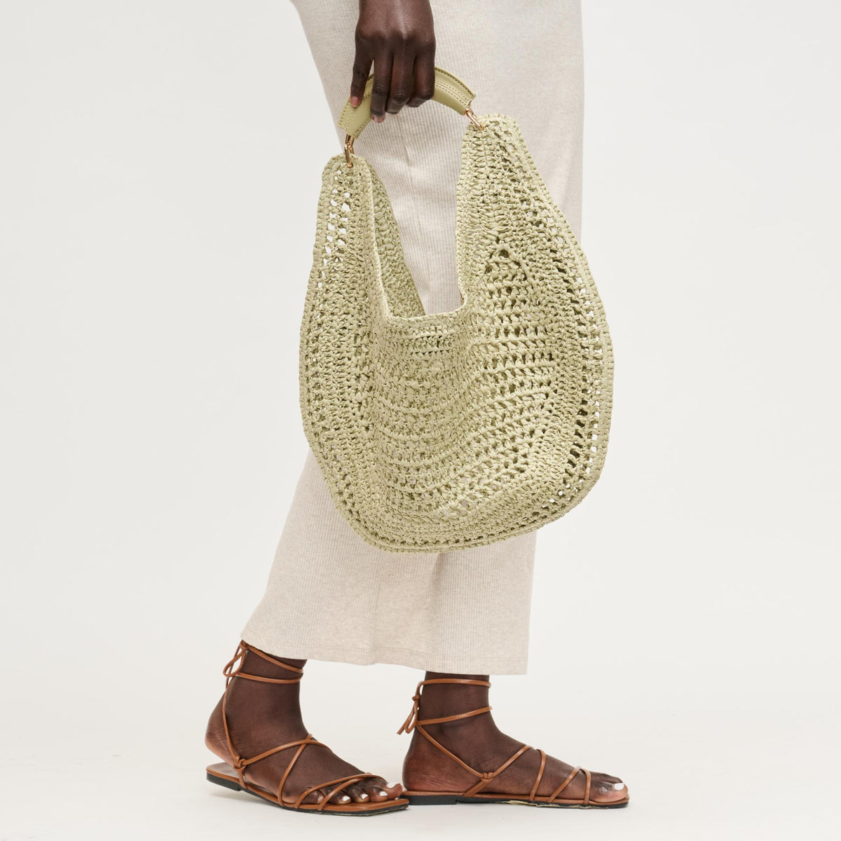 Woman wearing Sage Urban Expressions Camden Hobo 840504204500 View 4 | Sage