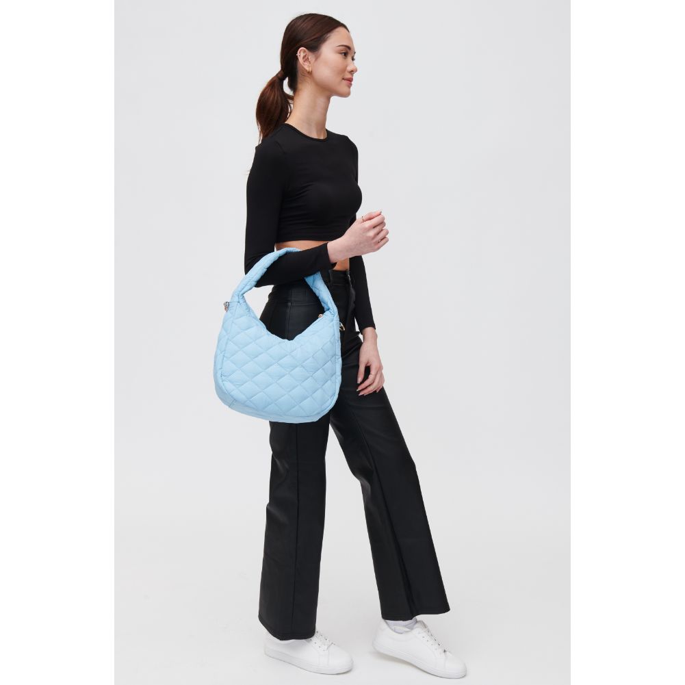 Woman wearing Baby Blue Urban Expressions Sonoma - Quilted Nylon Hobo 840611118462 View 2 | Baby Blue