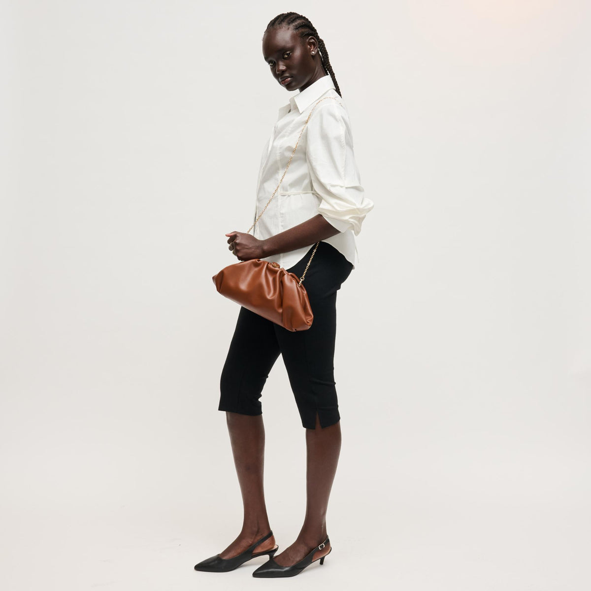 Woman wearing Chocolate Urban Expressions Jennifer Clutch 840504208249 View 2 | Chocolate