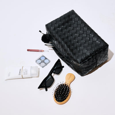 Woman wearing Black Urban Essentials Weave & Wander Cosmetic & Travel Organizer Pouch 840611197832 View 1 | Black