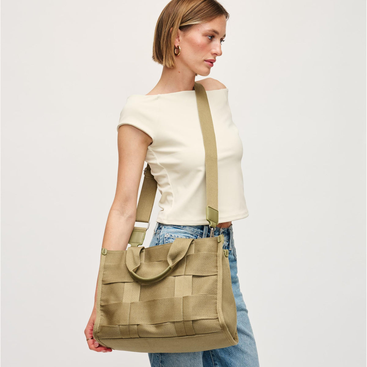 Woman wearing Sage Urban Expressions Cherie Satchel 840611157003 View 1 | Sage