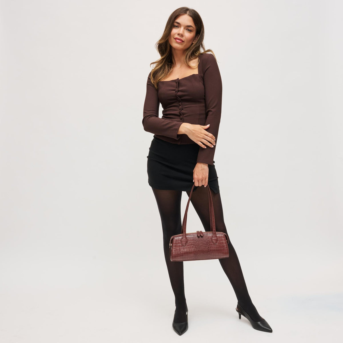 Woman wearing Chocolate Urban Expressions Nessa Shoulder Bag 840611199737 View 3 | Chocolate