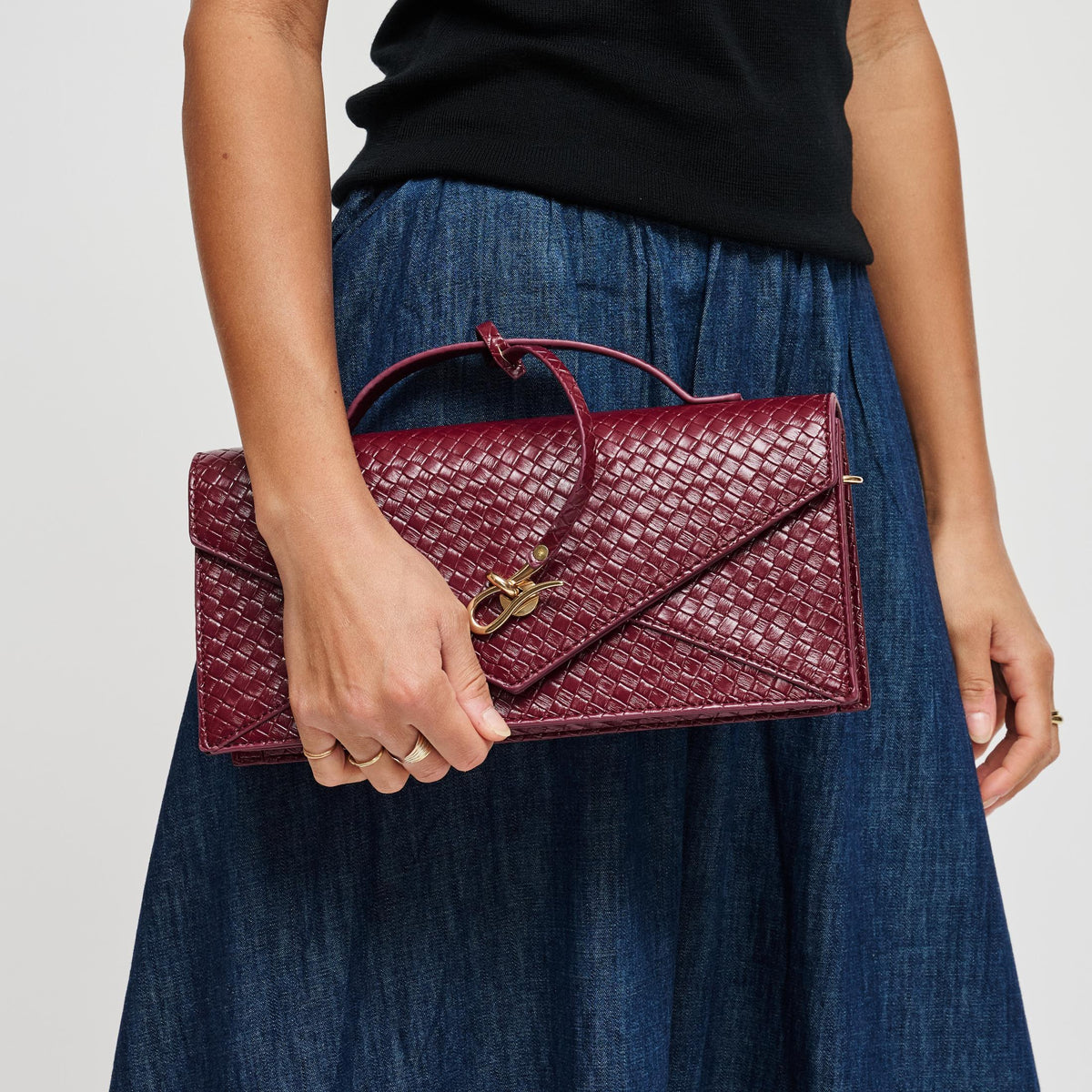 Woman wearing Burgundy Urban Expressions Khaleesi Clutch 840504211881 View 1 | Burgundy