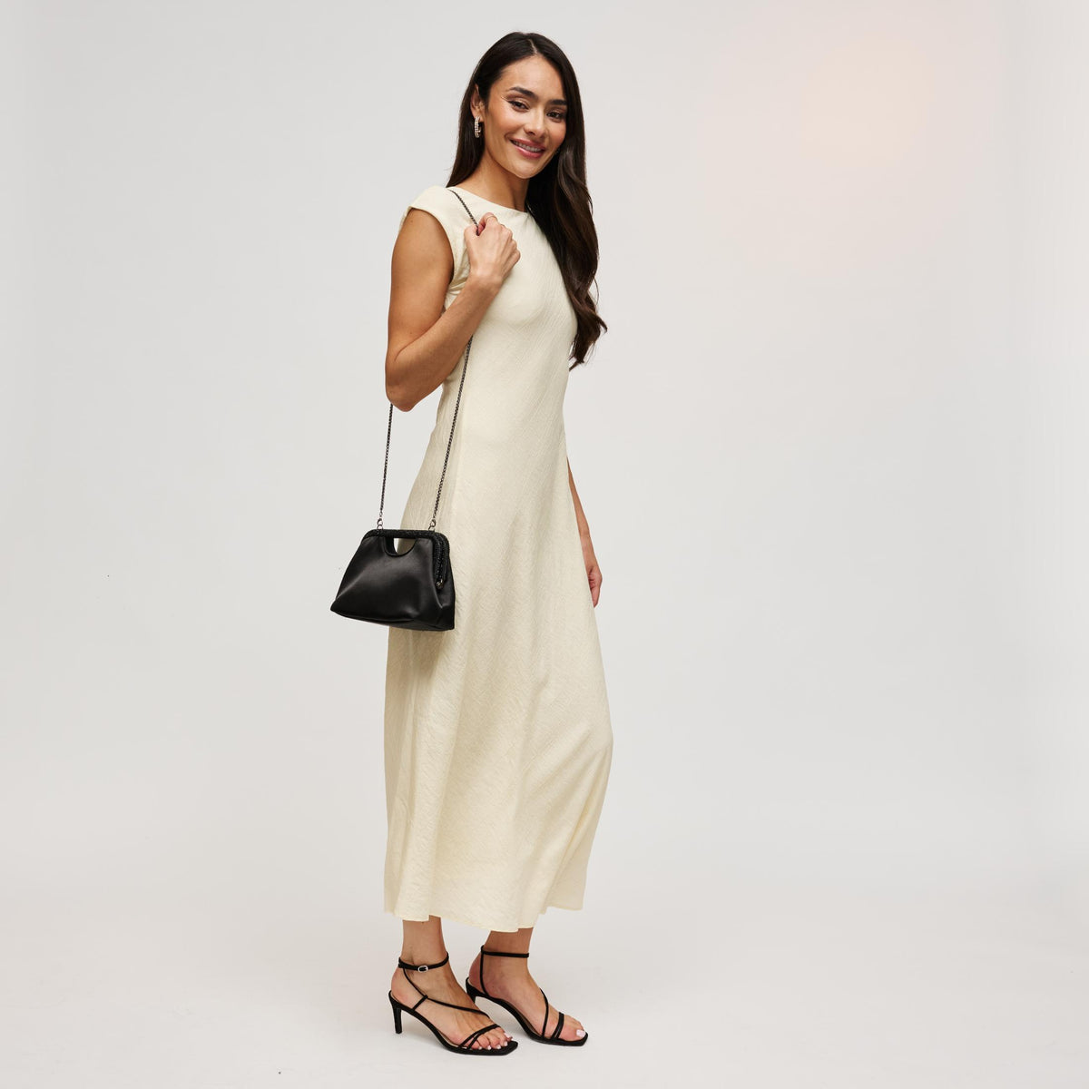 Woman wearing Black Urban Expressions Arthur Clutch 840504212918 View 4 | Black