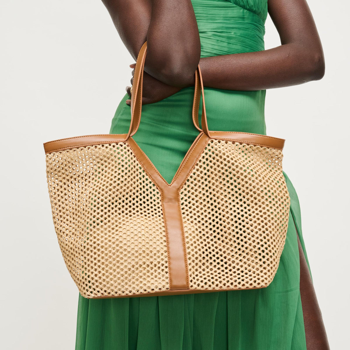 Woman wearing Natural Tan Urban Expressions Naida Tote 840504205910 View 1 | Natural Tan