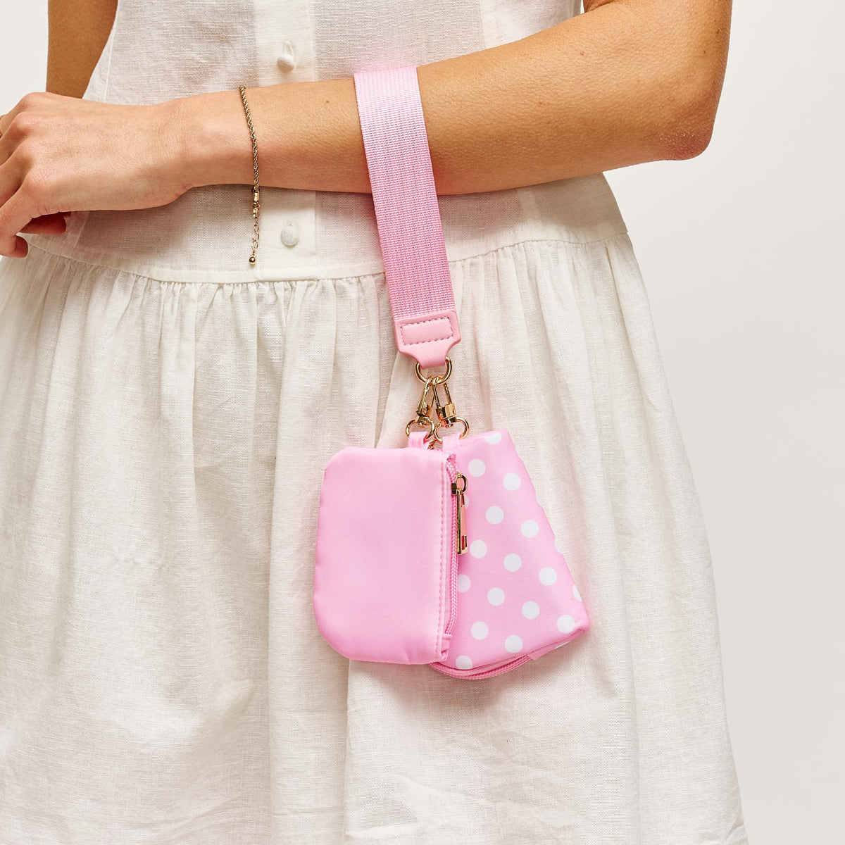 Woman wearing Pink Urban Expressions Link & Carry - Polka Dot Wristlet 840504202728 View 1 | Pink