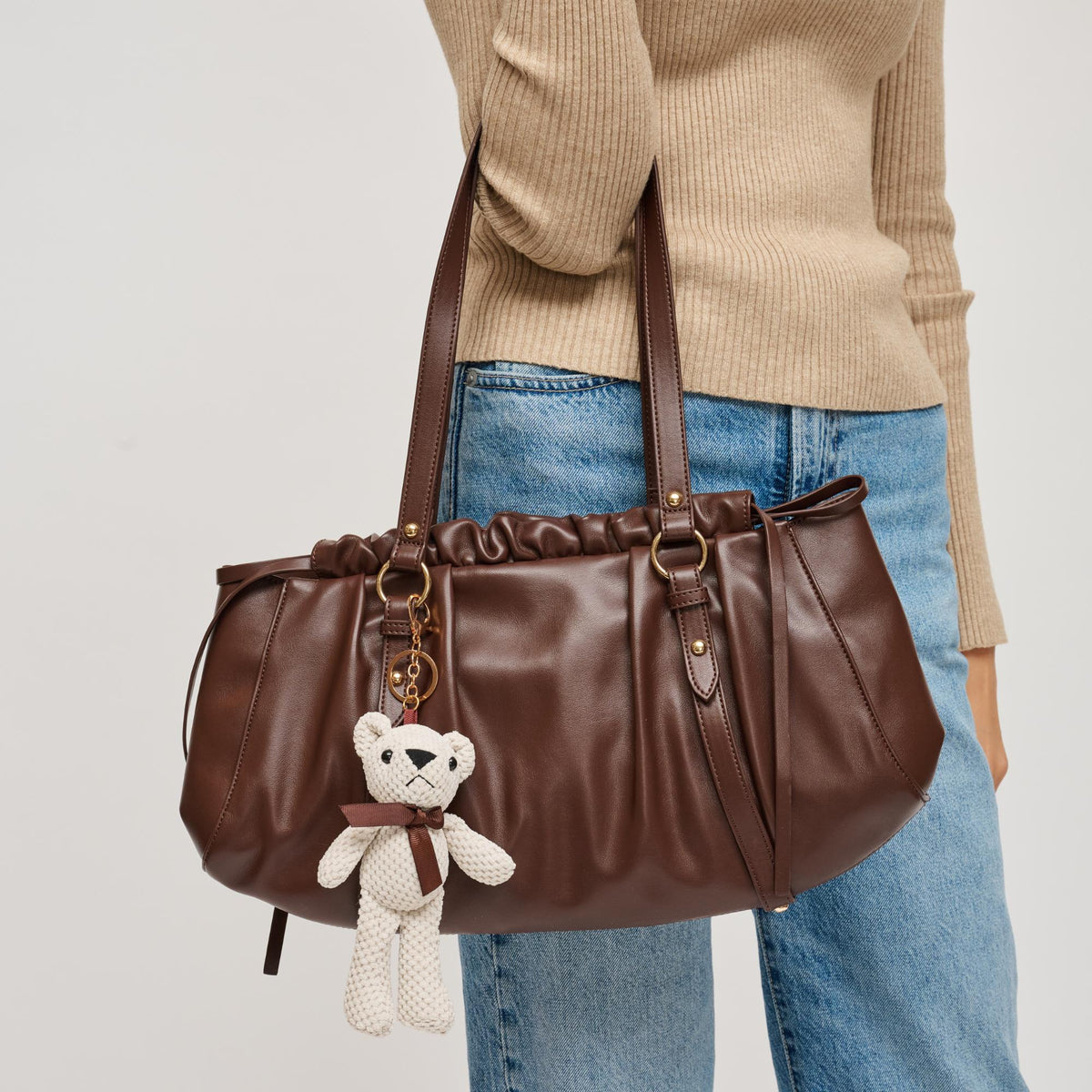 Woman wearing Chocolate Urban Expressions Pattington Shoulder Bag 840611199119 View 1 | Chocolate
