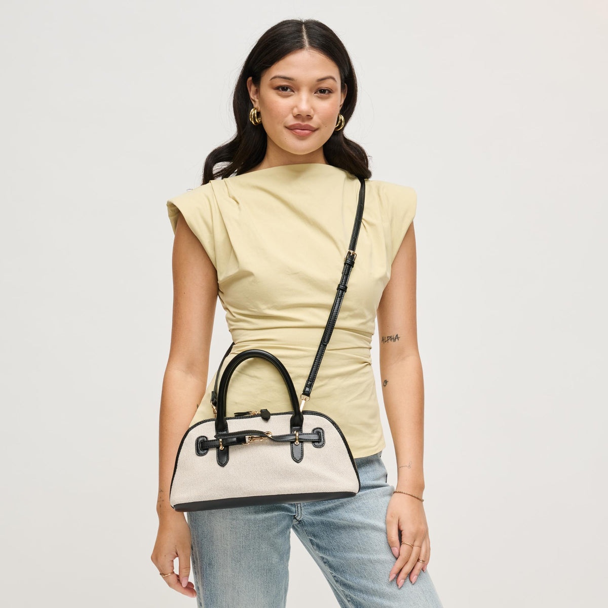 Woman wearing Ivory Black Urban Expressions Amelia Crossbody 840504207884 View 1 | Ivory Black