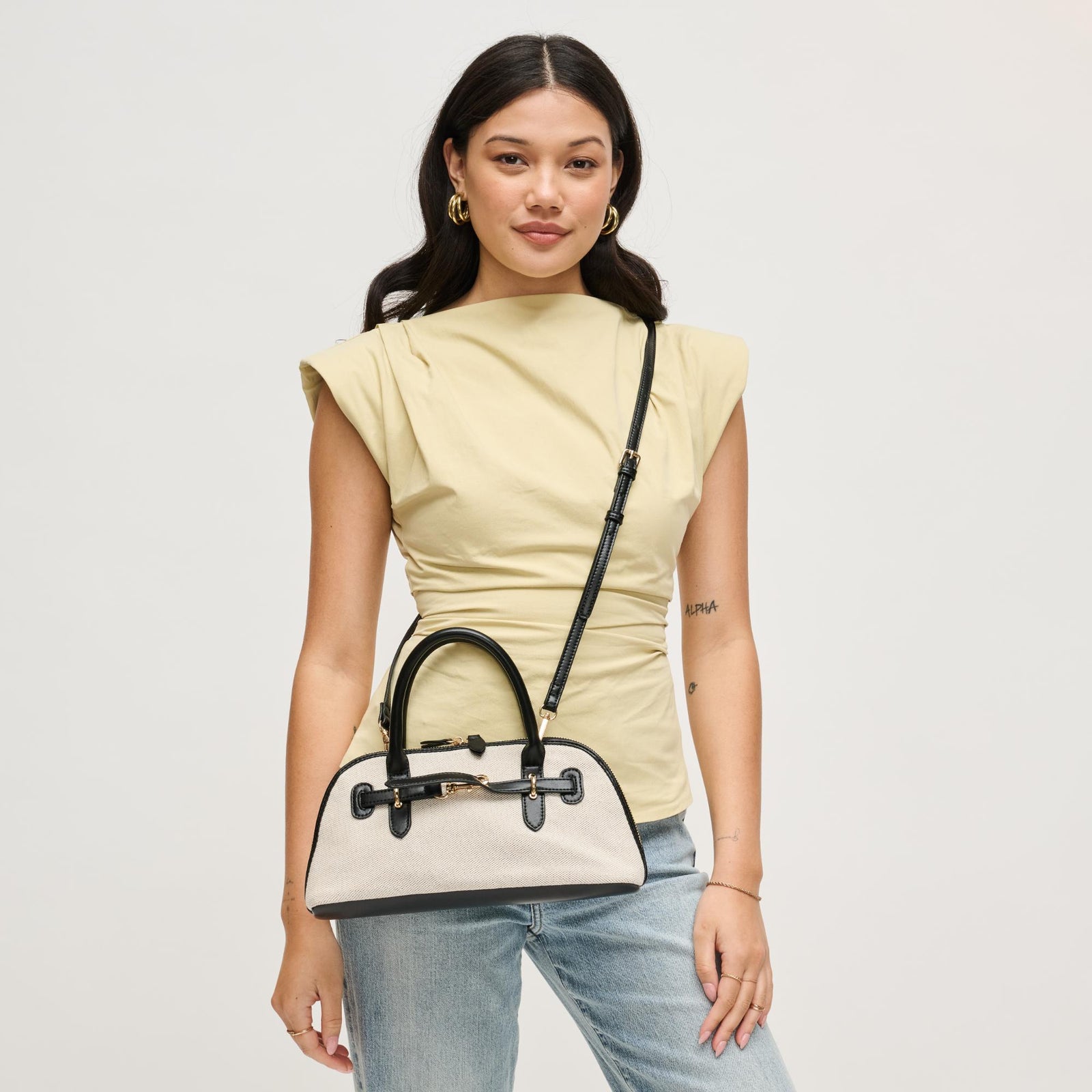 Woman wearing Ivory Tan Urban Expressions Amelia Crossbody 840504207877 View 1 | Ivory Tan