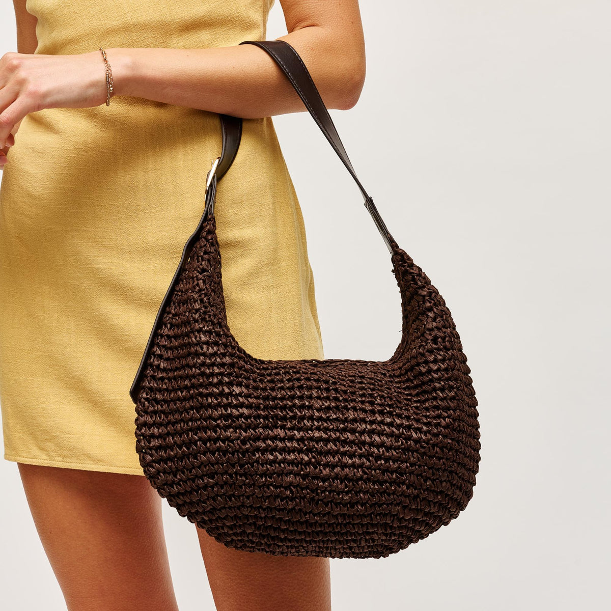 Woman wearing Chocolate Urban Expressions Jasmine Hobo 840504204777 View 1 | Chocolate