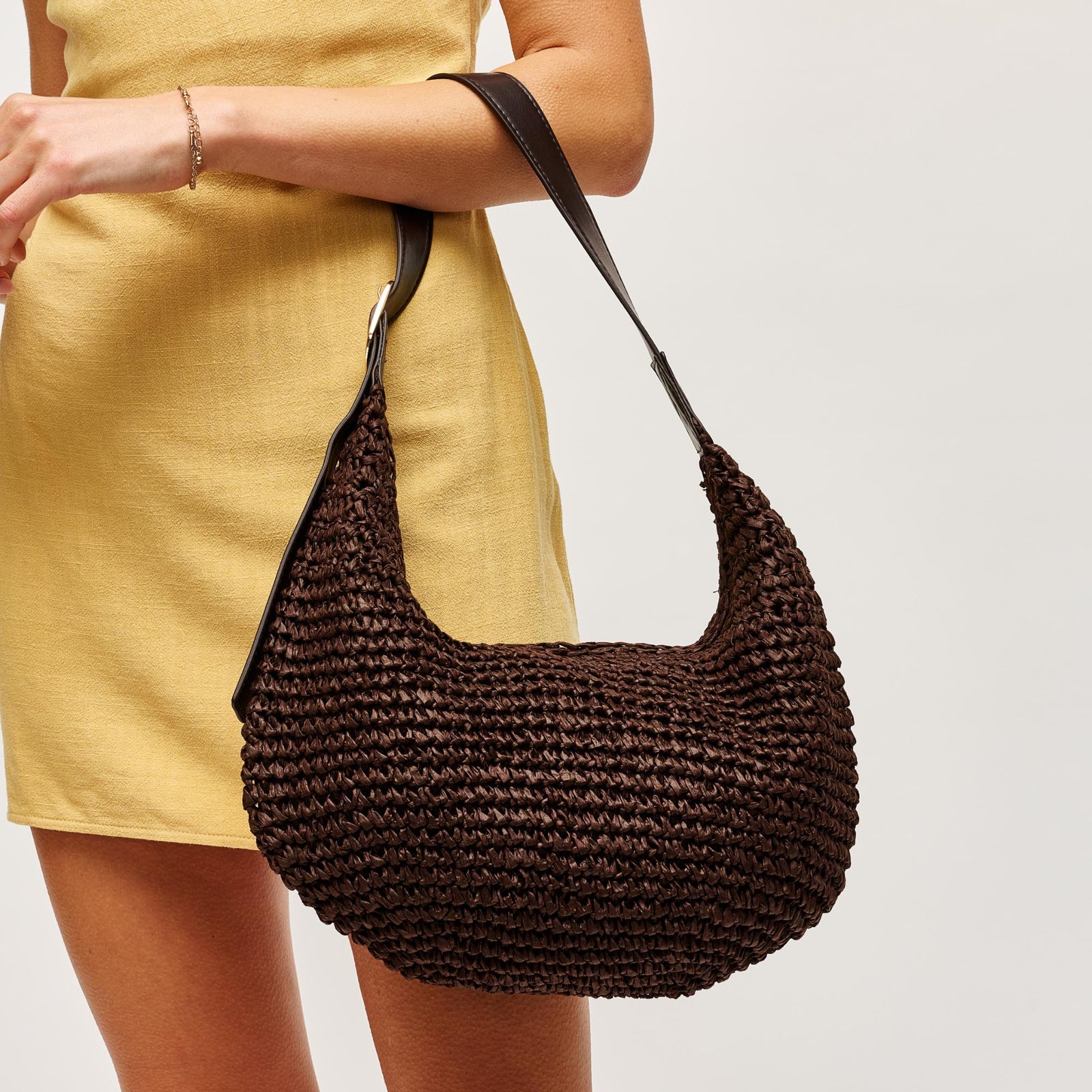 Woman wearing Chocolate Urban Expressions Jasmine Hobo 840504204777 View 1 | Chocolate