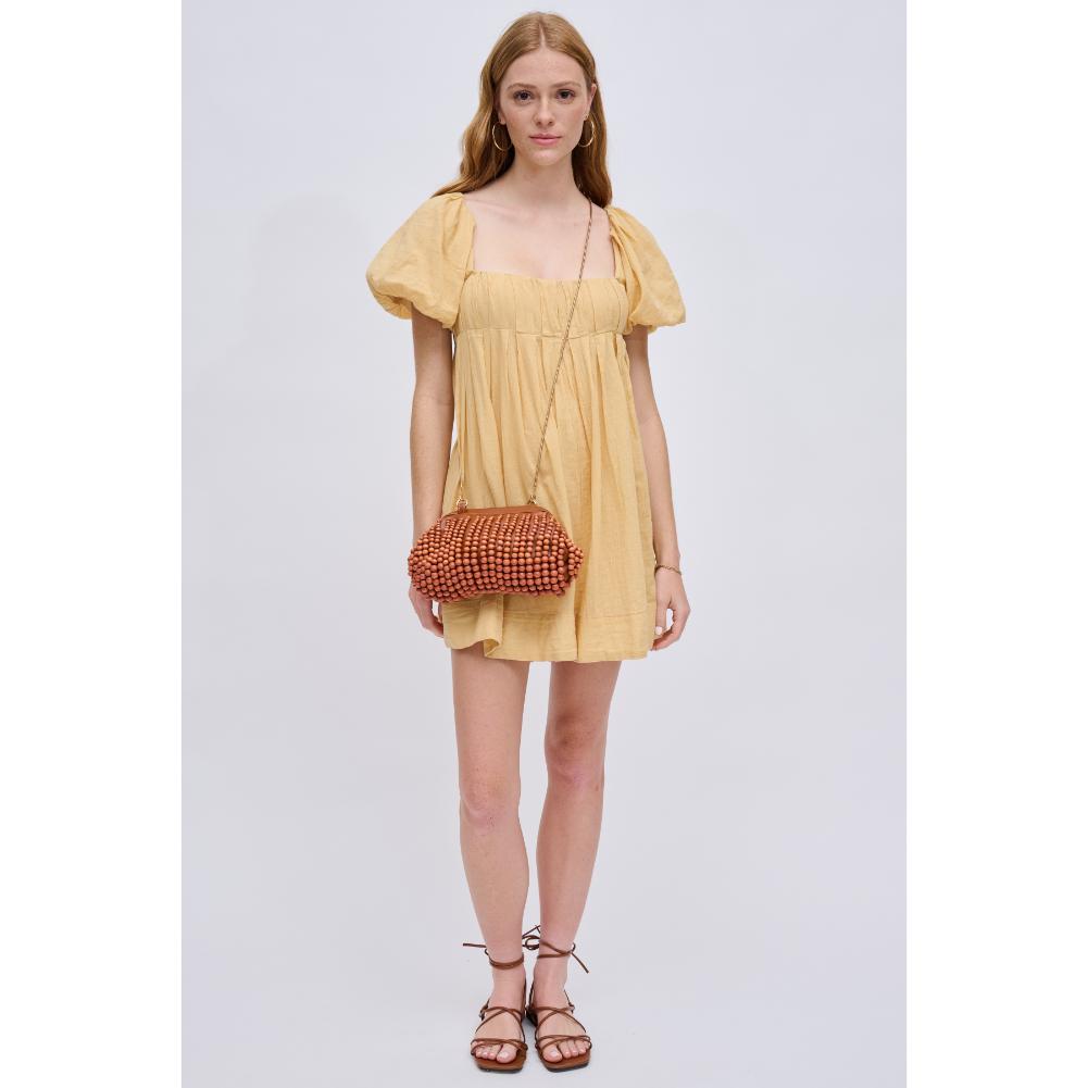 Woman wearing Tan Urban Expressions Lydia Clutch 840611191533 View 4 | Tan