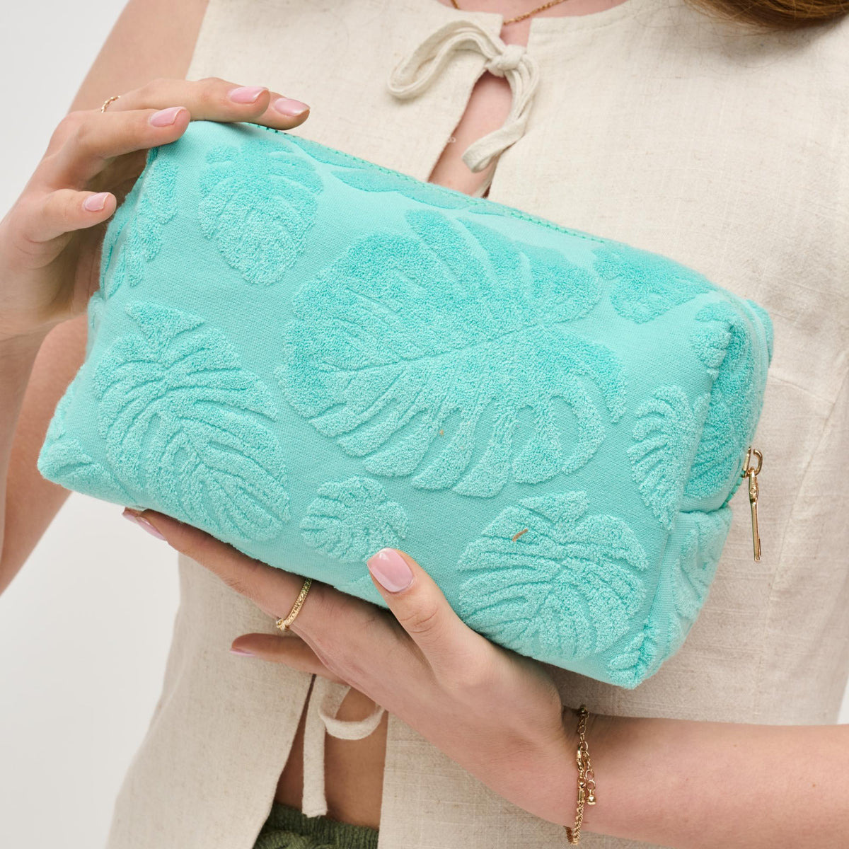 Woman wearing Seafoam Urban Essentials Palm Breeze Cosmetic & Travel Organizer Pouch 840611195319 View 1 | Seafoam