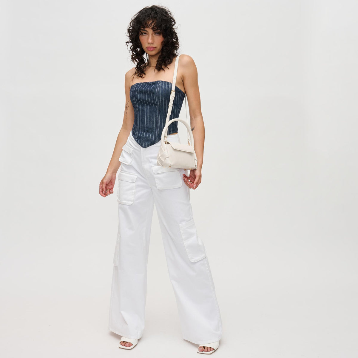 Woman wearing Ivory Urban Expressions Devin Crossbody 840611192035 View 3 | Ivory