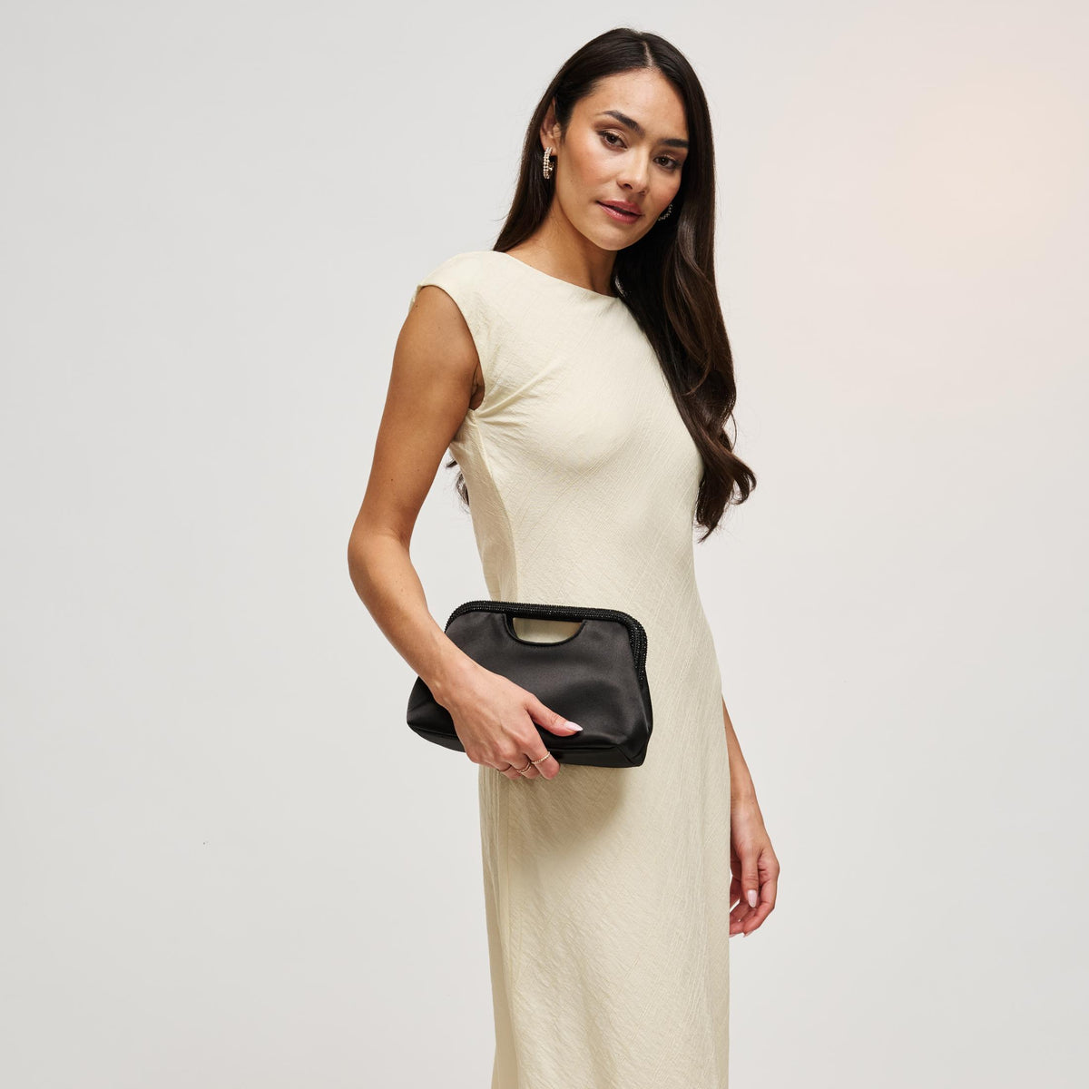 Woman wearing Black Urban Expressions Arthur Clutch 840504212918 View 2 | Black