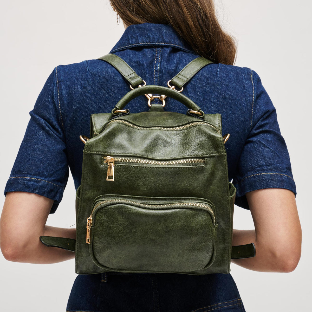 Woman wearing Olive Urban Expressions Miles Backpack NA-840611166753 View 2 | Olive
