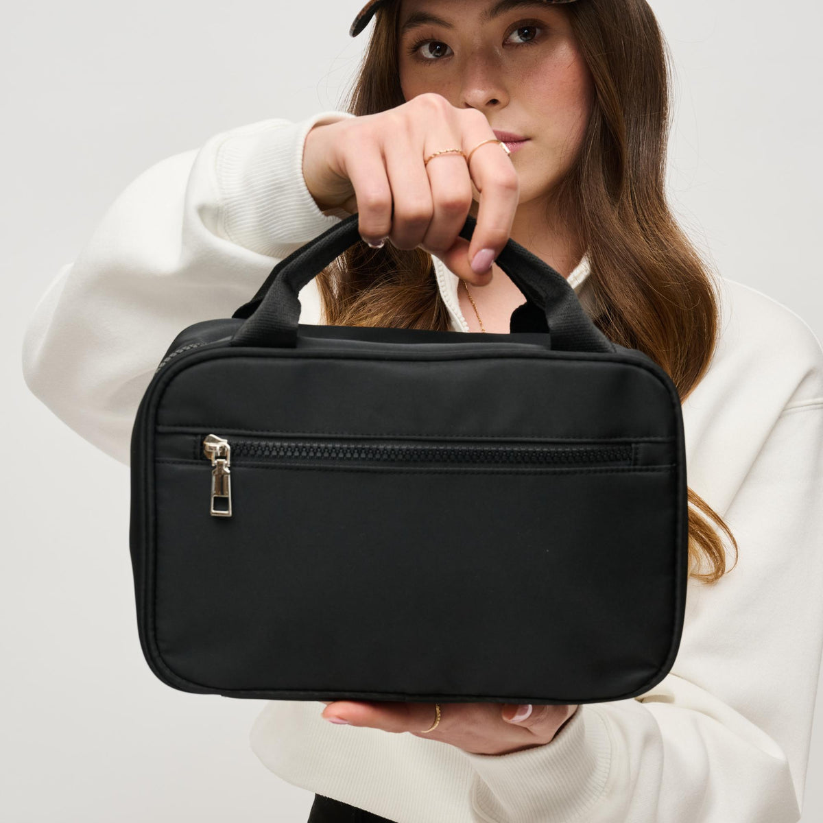 Woman wearing Black Urban Essentials Journey Keeper Travel Organizer 840611195388 View 2 | Black