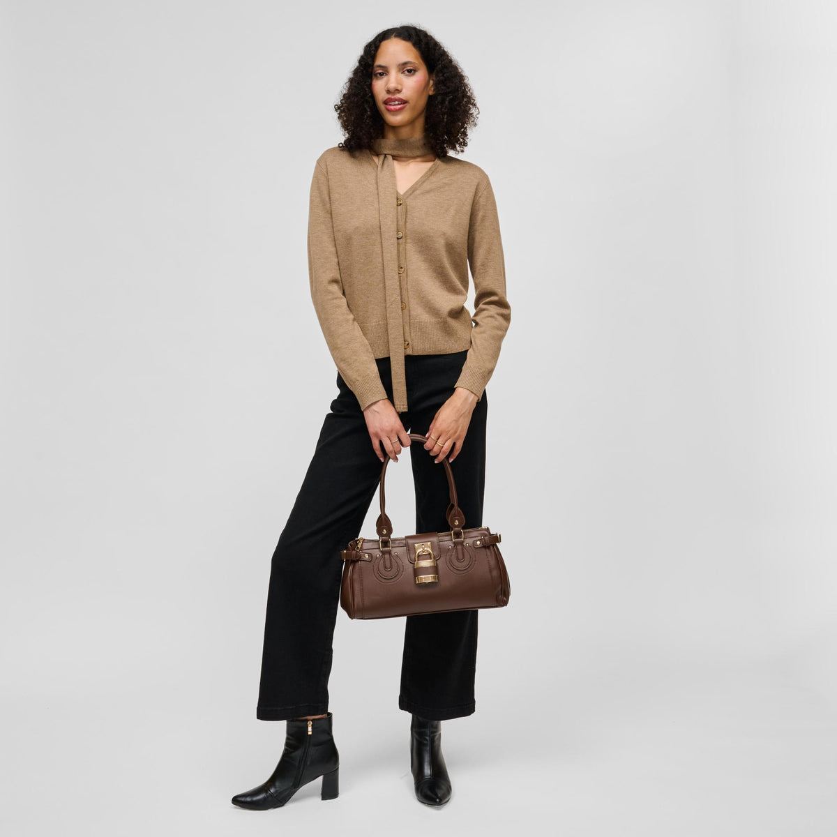 Woman wearing Brown Urban Expressions Moda Satchel 840504211690 View 4 | Brown