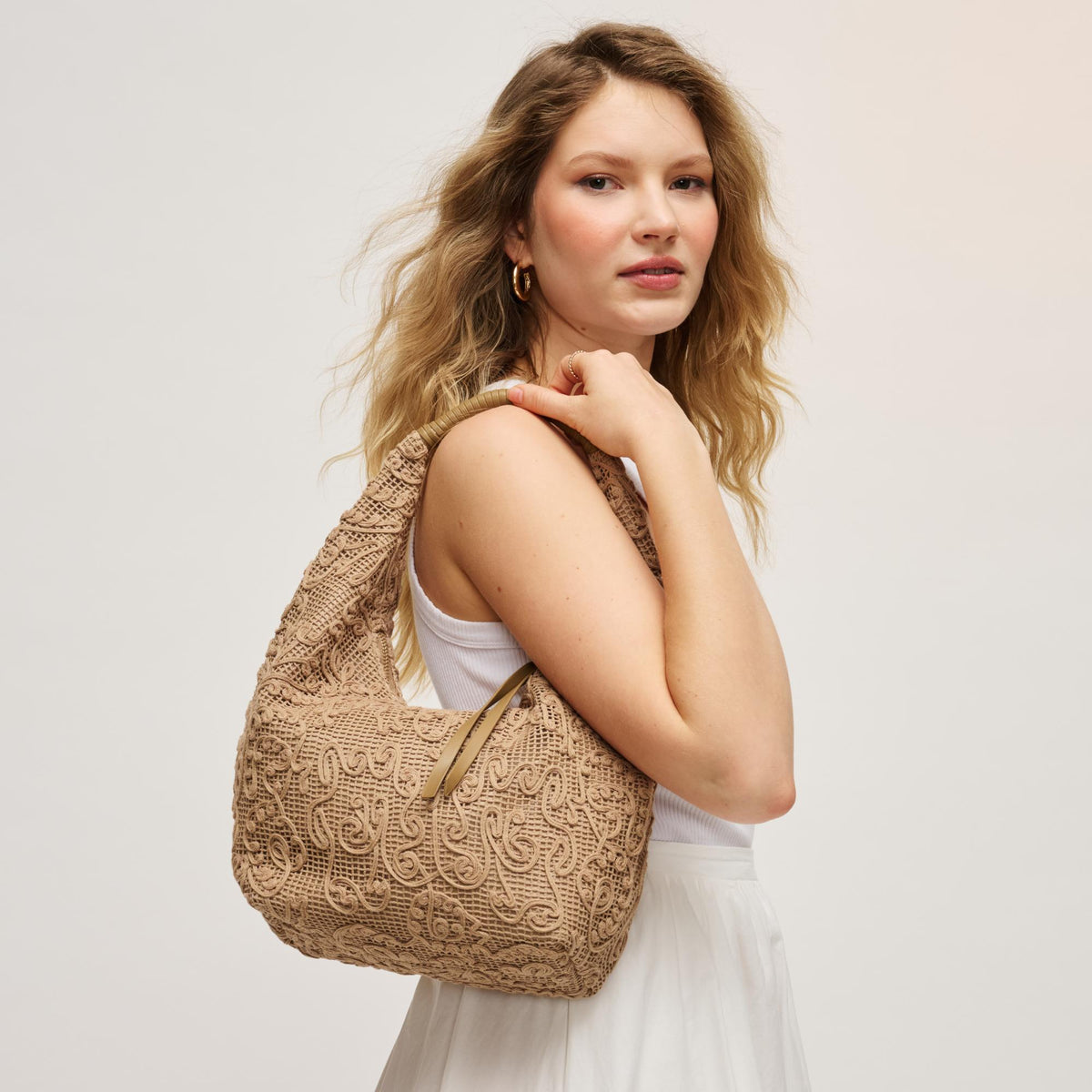 Woman wearing Natural Urban Expressions Micah Hobo 840504205231 View 1 | Natural