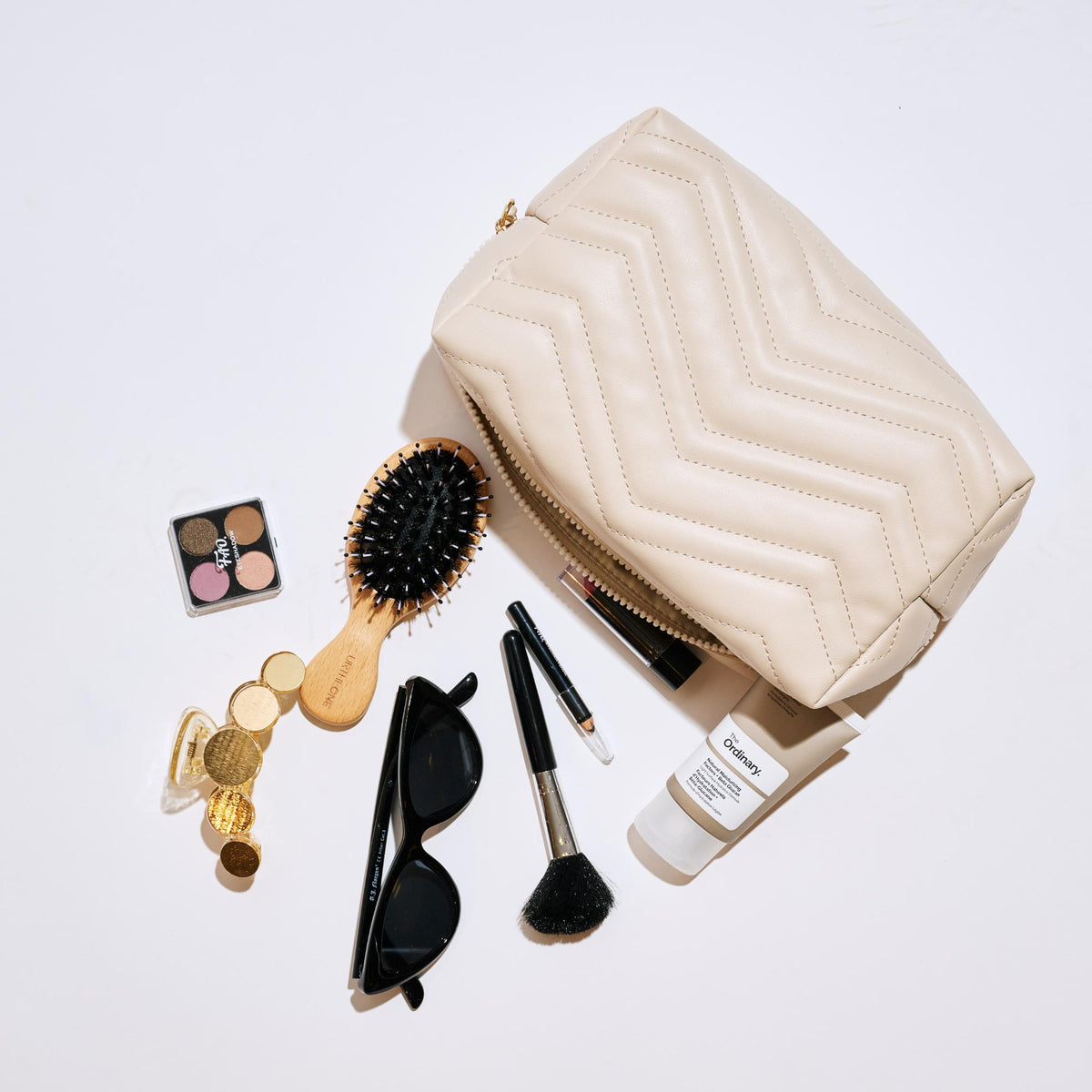 Woman wearing Oatmilk Urban Essentials Chic Stitch Cosmetic & Travel Organizer Pouch 840611197184 View 1 | Oatmilk