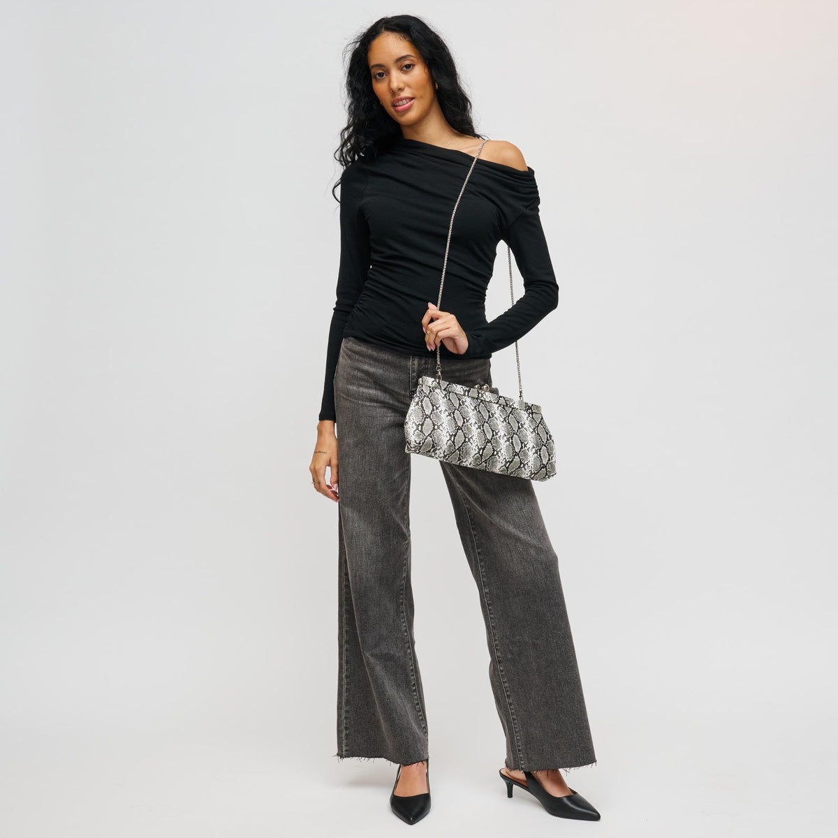 Woman wearing Black White Urban Expressions Joplin - Kisslock Clutch 840504200779 View 3 | Black White