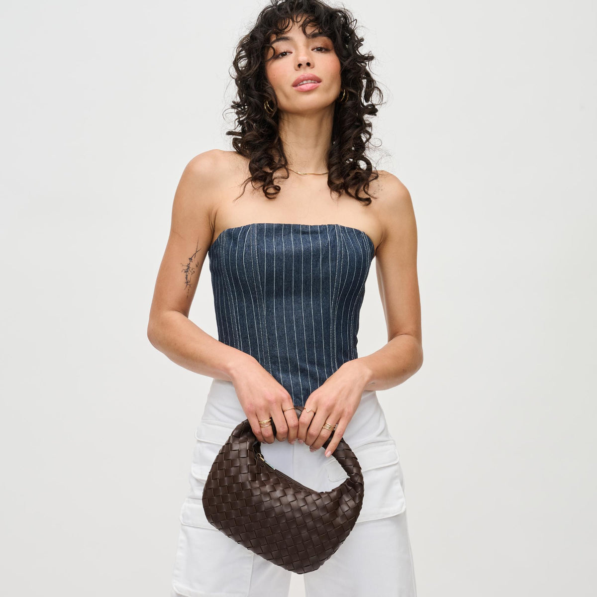 Woman wearing Espresso Urban Expressions Tracy - Woven Clutch 840611192943 View 2 | Espresso